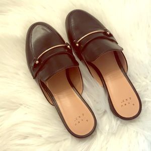 New black & gold backless loafers
